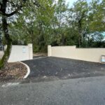 AZ BTP, aménagement paysager, création d'un mur de clôture ainsi que revêtement sol extérieur en goudron / bitume pour un particulier dans le Rhône sur la commune de Charnay