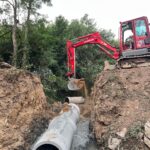 AZ BTP, Terrassement, changement d'une buse en béton d'un diamètre 80cm avec enrochement et création d'un pont dans le Rhône à Marcy l'étoile